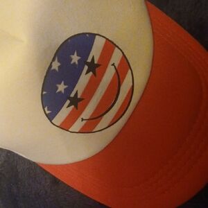 Red and White Smiley Face Cap